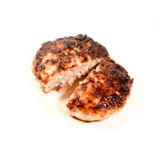 半分にカットされた、肉詰まりが良くふっくらとした中サイズの手焼きハンバーグ